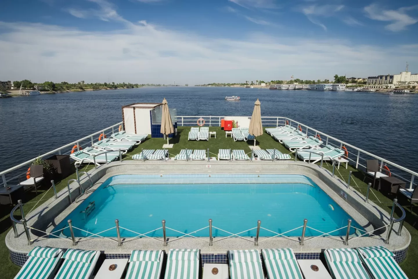River Nile cruise relaxing pool views aboard Odyssey Nile Cruise